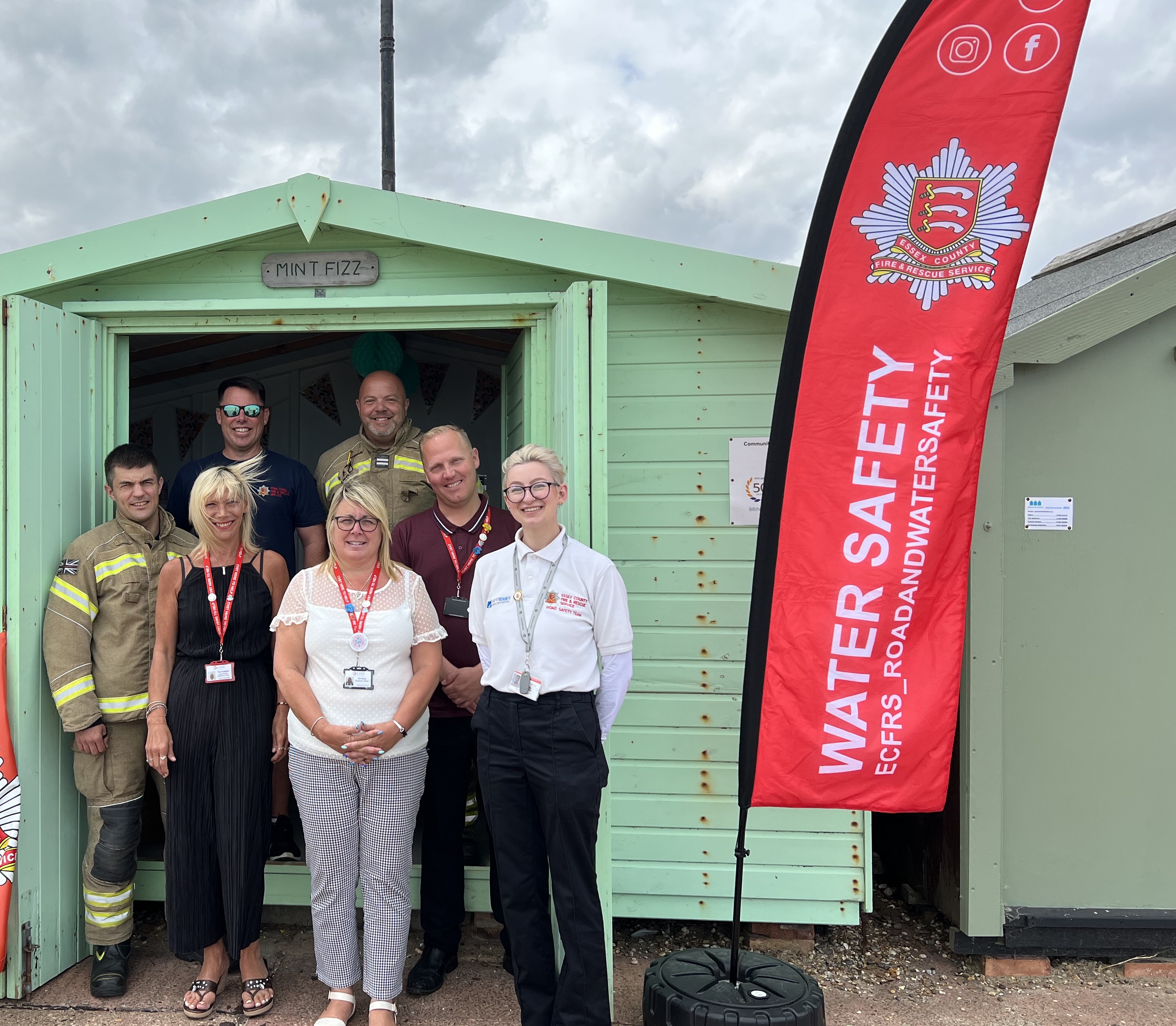 ECFRS staff with CVST staff in front of beach hut in Clacton