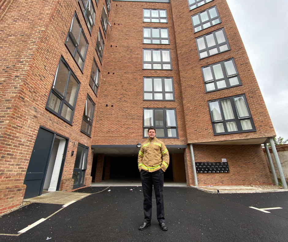 Jim Palmer standing in front of Amleen House Colchester