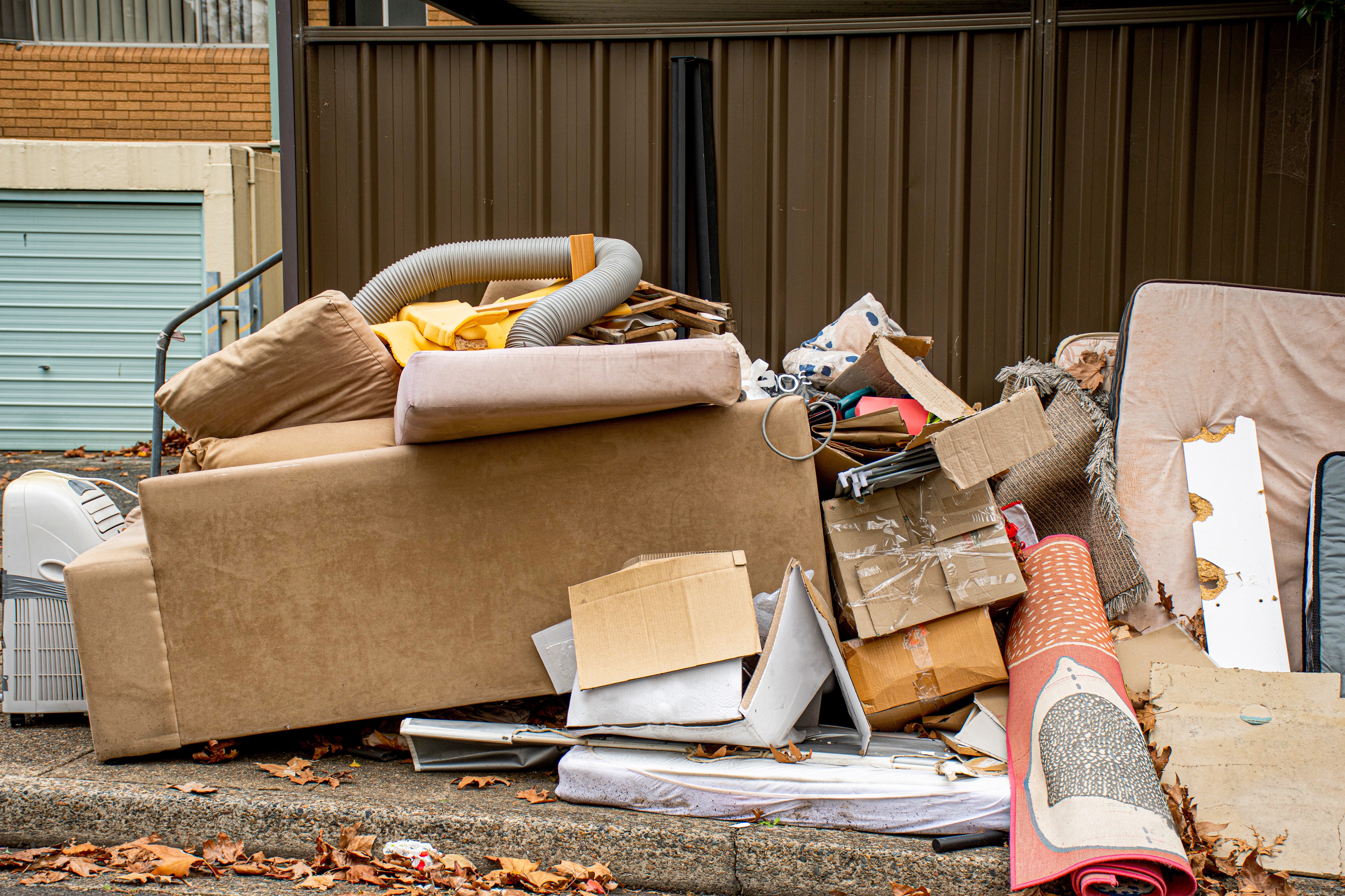 Photo of piles of rubbish and furniture