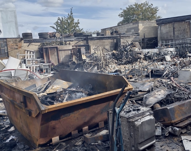 Damaged scrap yard after fire