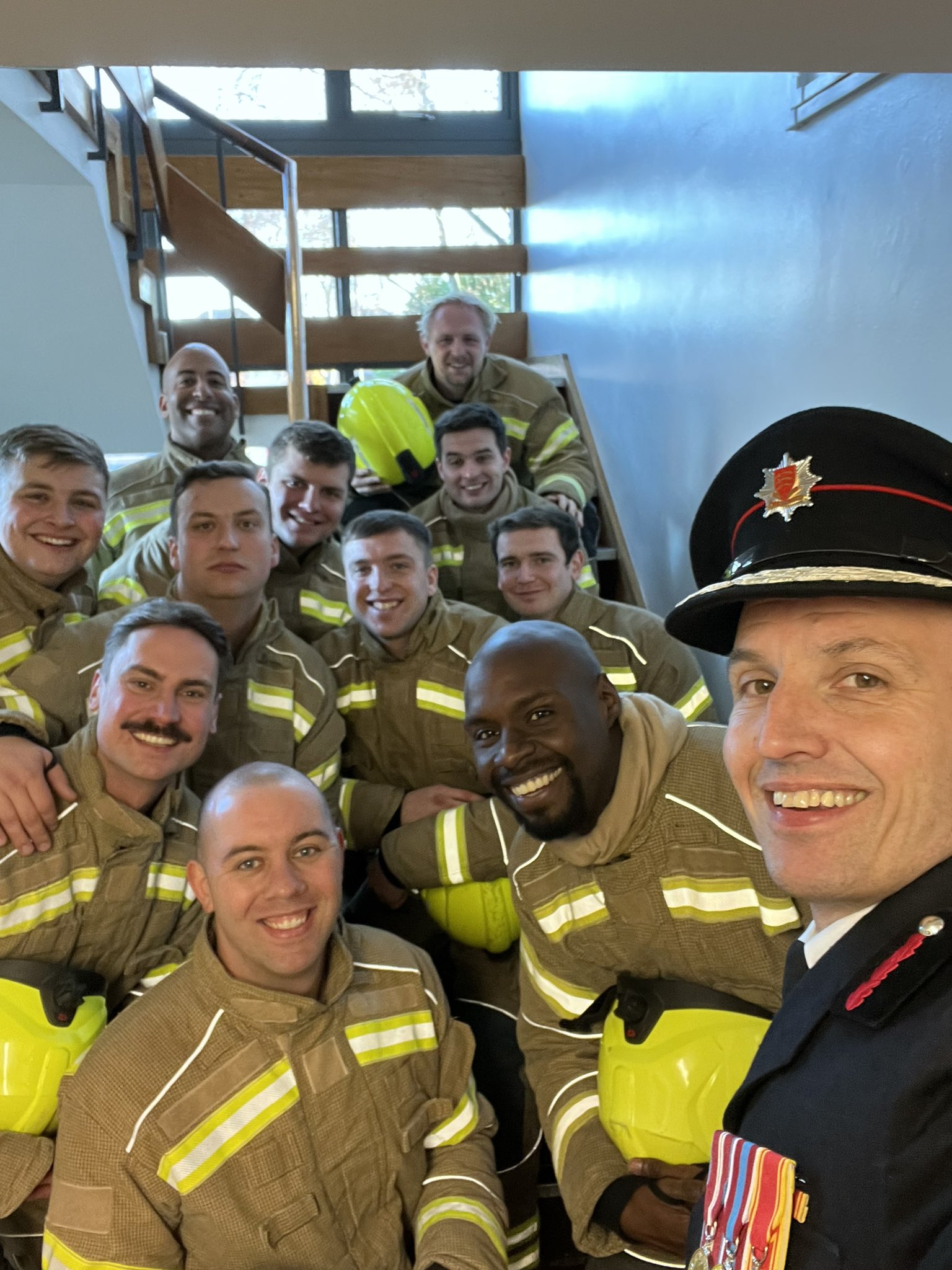 Rick Hylton, Chief Fire Officer with new recruits in December 2022