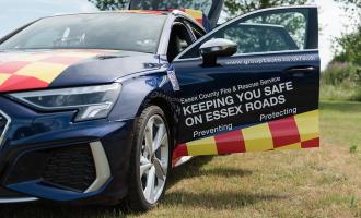 An ECFRS FireCar with the door open and the words 'keeping you safe on Essex roads'