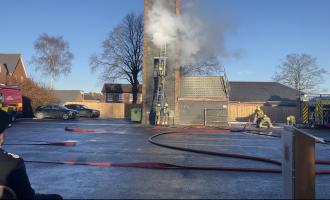 Firefighter carrying out a fire training drill