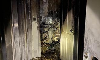 A hallway completely burned out from fire