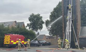 Firefighters performing a fire drill