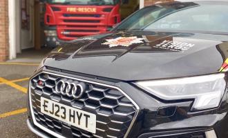 new fiercer with fire engine in background