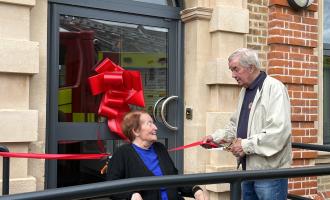 Retired firefighter Brian Jacobs and Councillor Anne Chalk officially opening the fire station