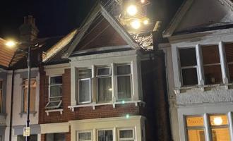 An Aerial Ladder Platform above a terraced house