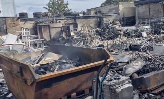 Damaged scrap yard after fire