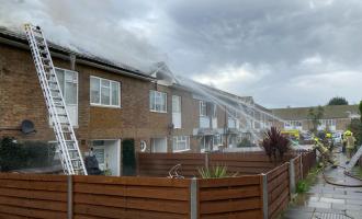 Firefighters extinguishing house fire in Basildon