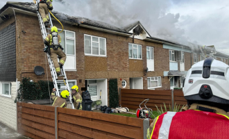 Firefighters extinguishing house fire in Basildon