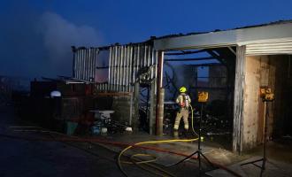 Firefighters at industrial unit fire