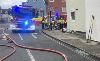 Firefighters at the scene of a flat fire in Colchester