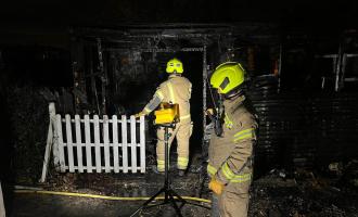 Firefighters at the scene of a shed fire in Rochford