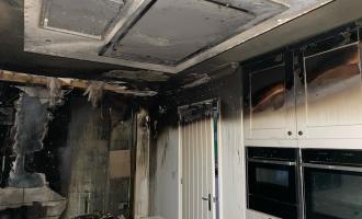 A kitchen smoke damaged after a fridge freezer fire