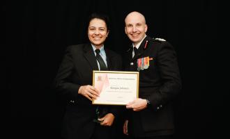Firefighter Keegan Johnson with Chief Fire Officer Rick Hylton