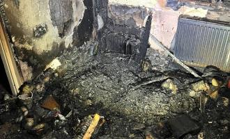 A living room destroyed by fire
