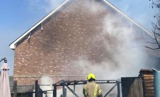 Firefighters at the scene of a garden fire in Chelmsford