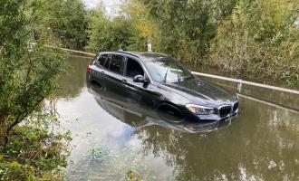 A car stuck in Buttsbury Wash