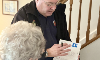 Dean carrying out a Home Safety Visit with elderly resident