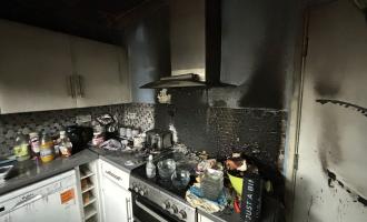 A fire damaged kitchen following a hob fire