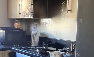 A kitchen smoke damaged after a pan fire