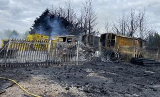 The scene after fires in lorries and skips