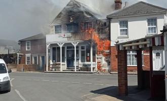 Wooden building on fire