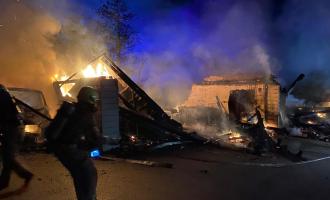 Firefighters at the scene of a garage fire