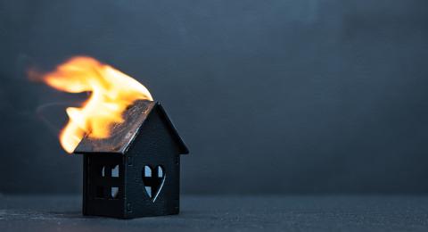 Model House with roof on fire