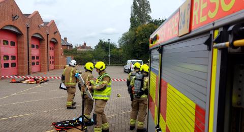 Firefighters and a fire station