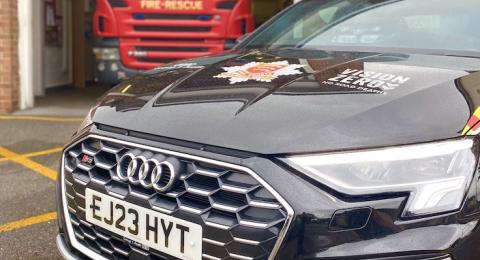 new fiercer with fire engine in background