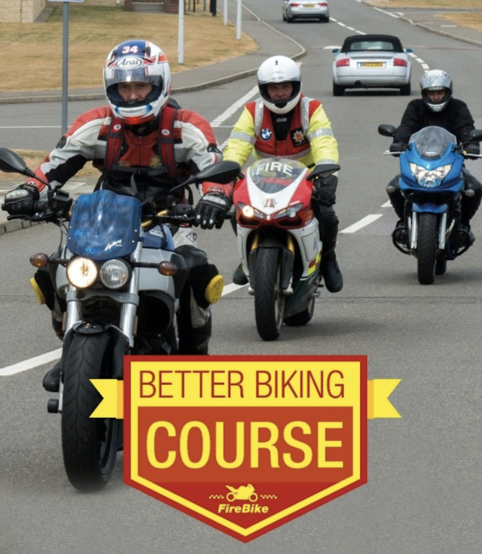 A FireBike instructor with two motorcyclists on a Better Biking course