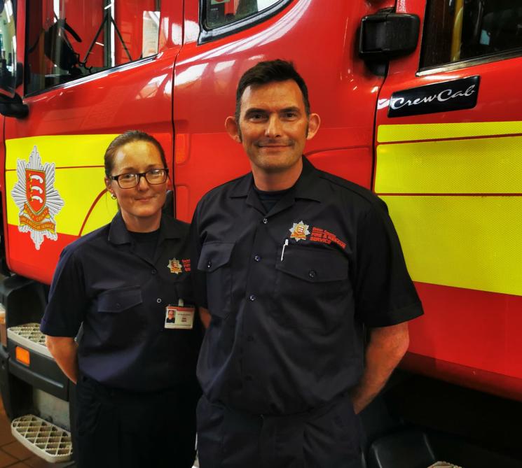 Firefighter Claire (left) and Paul (right) in front of fire engine