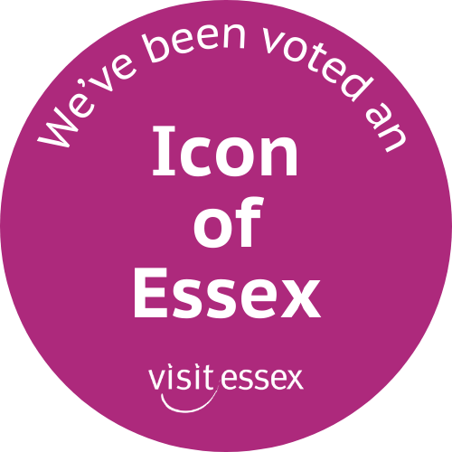 Round sticker that says 'We've been voted an Icon of Essex'.