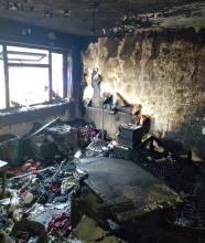 A fire-damaged bedroom