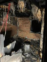 A fire-damaged bedroom