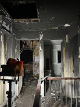 A fire-damaged bedroom