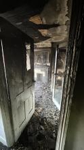 Fire and smoke damage to room after a portable heater fire