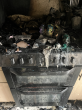 A burnt hob and kitchen