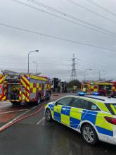 Firefighters at the scene of a lorry fire near the M25