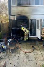 fire damaged house due to bonfire