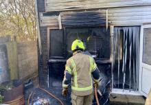 fire damaged house due to bonfire