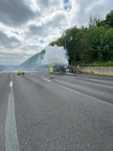 A bin lorry on fire on the M25