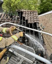 house damaged by fire in Buckhurst Hill