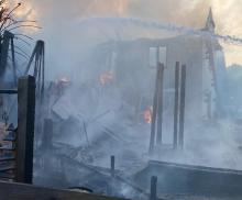 The charred remains of an outbuilding