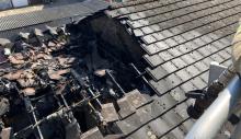 A burnt roof after a fire