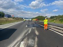 An overturned lorry on the M11