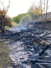 Smoke rising from debris