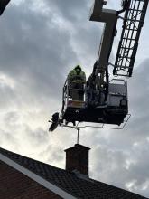 The aerial ladder platform and hawk on the aerial